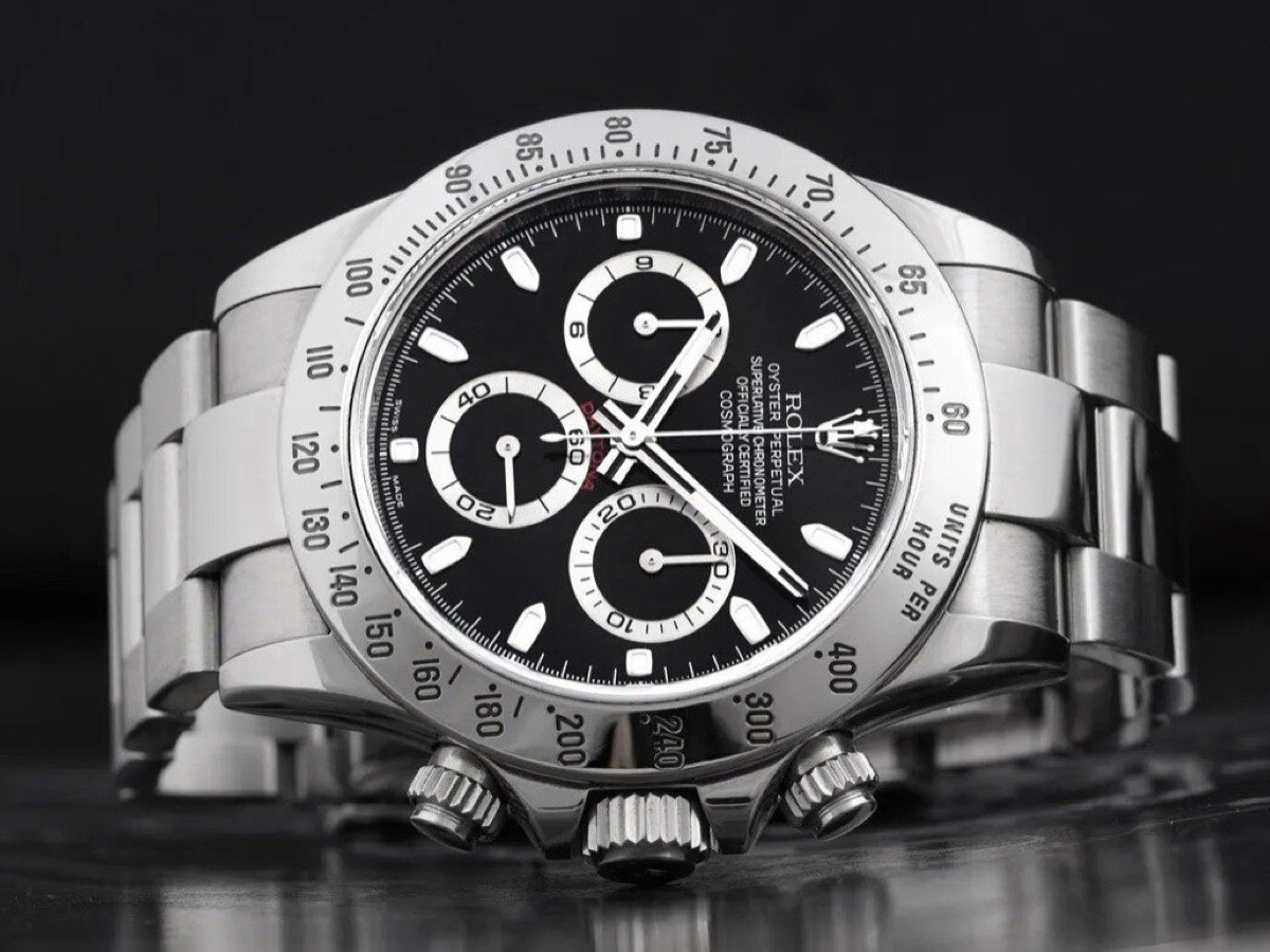 Stainless steel Rolex Daytona with black dial, low angle view